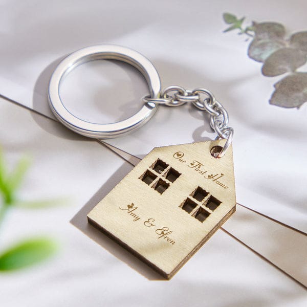 personalized engraved house keychains as a housewarming gift
