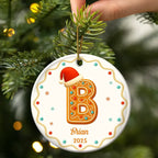 GingerbreadLettersWithSantaHat2025-PersonalizedCircleCeramicOrnament-TH131-VKT209-MK2_38d23887-ff2d-4b49-b057-631edc26e060