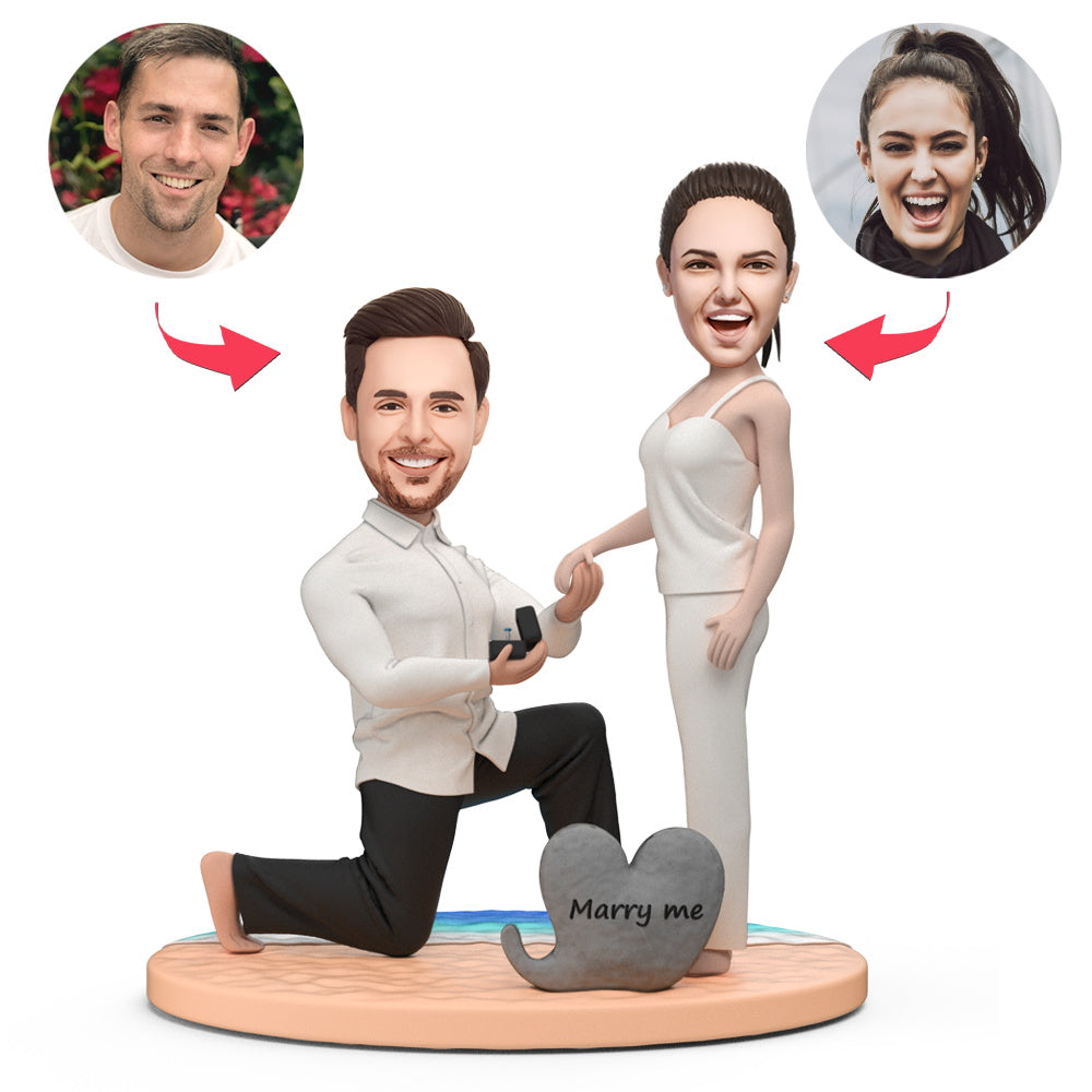 custom bobble head keepsake full character figurine wedding couple proposing couple beach front view