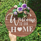 warm welcome wooden door sign as a new home gift