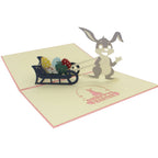 Easter Bunny Pulling a Cart of Colorful Eggs 3D Pop - Up Greeting Card - DiyGiftly
