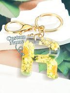 Personalized Name Light Yellow Dried Flower Letter Keychain – Custom Alphabet Bag Charm - DiyGiftly